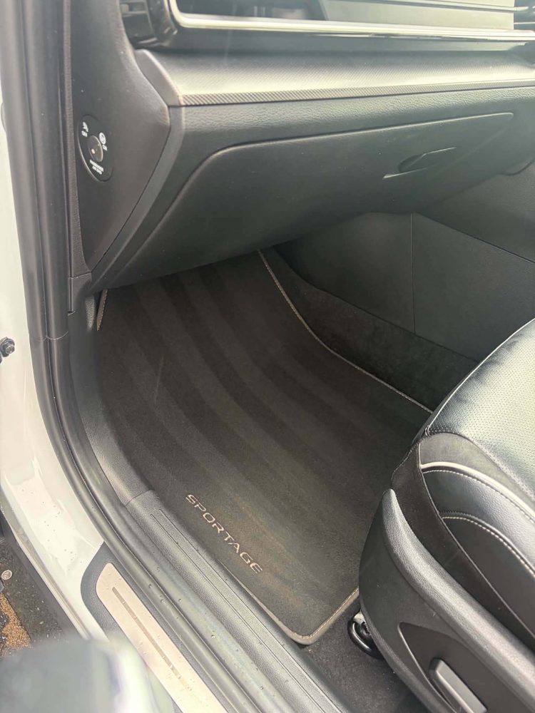 A cleaned Kia Sportage door sill and footwell with the plastics dressed